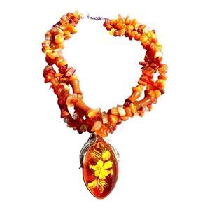 Triple strand agate goldstone necklace with reverse carved amber lucite pendant